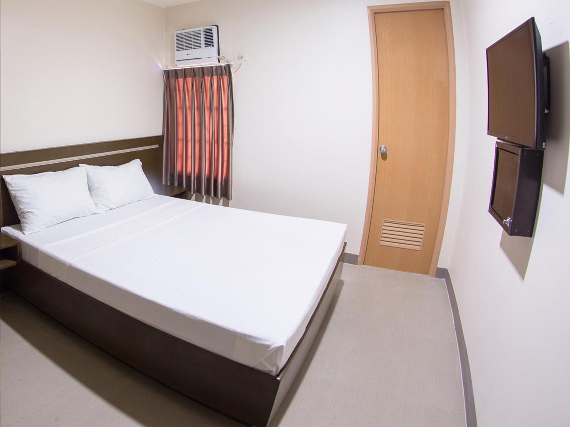 Emerald Suites Cdo Cagayan de Oro Værelse billede